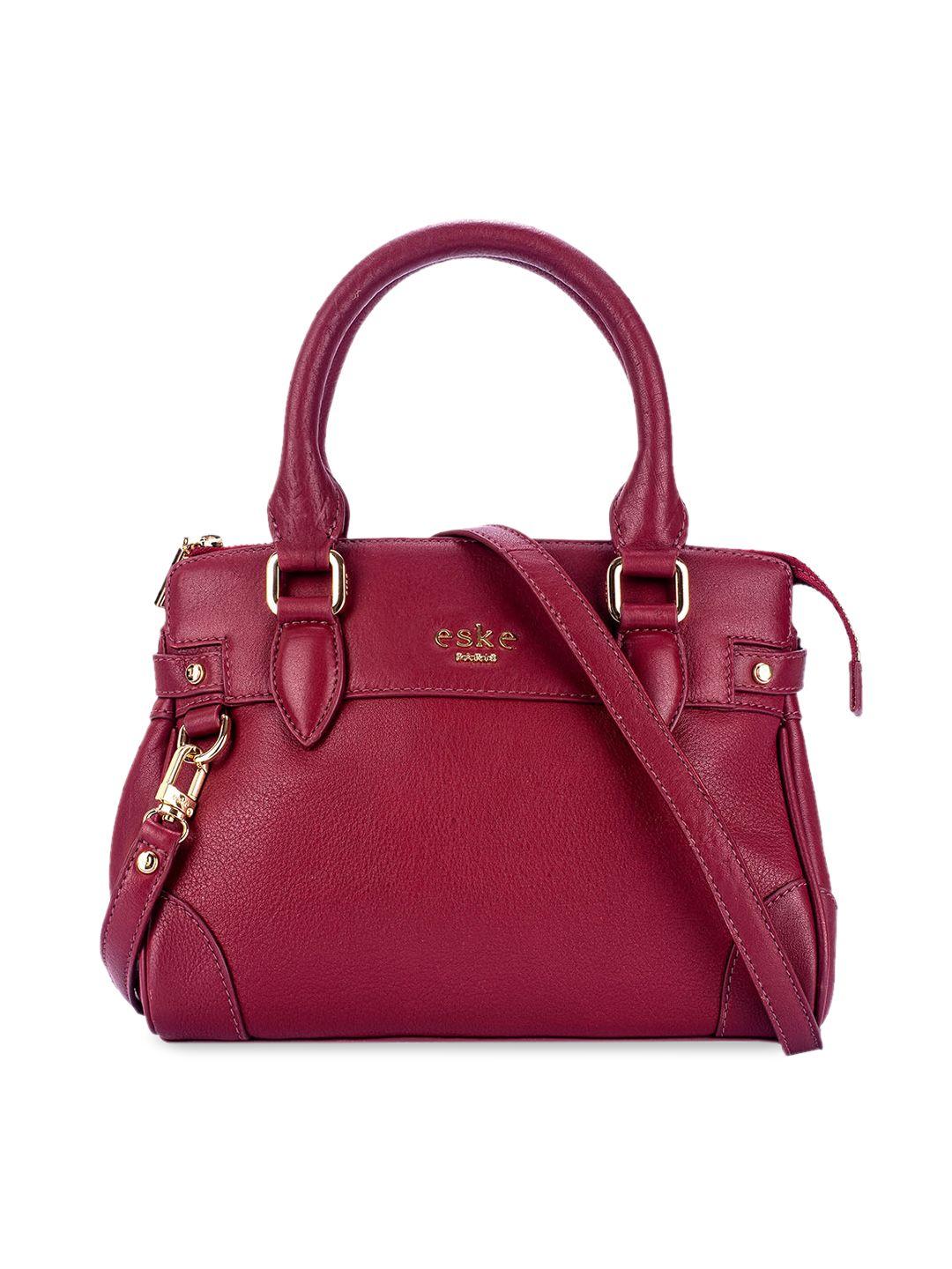 eske magenta solid genuine leather handheld bag