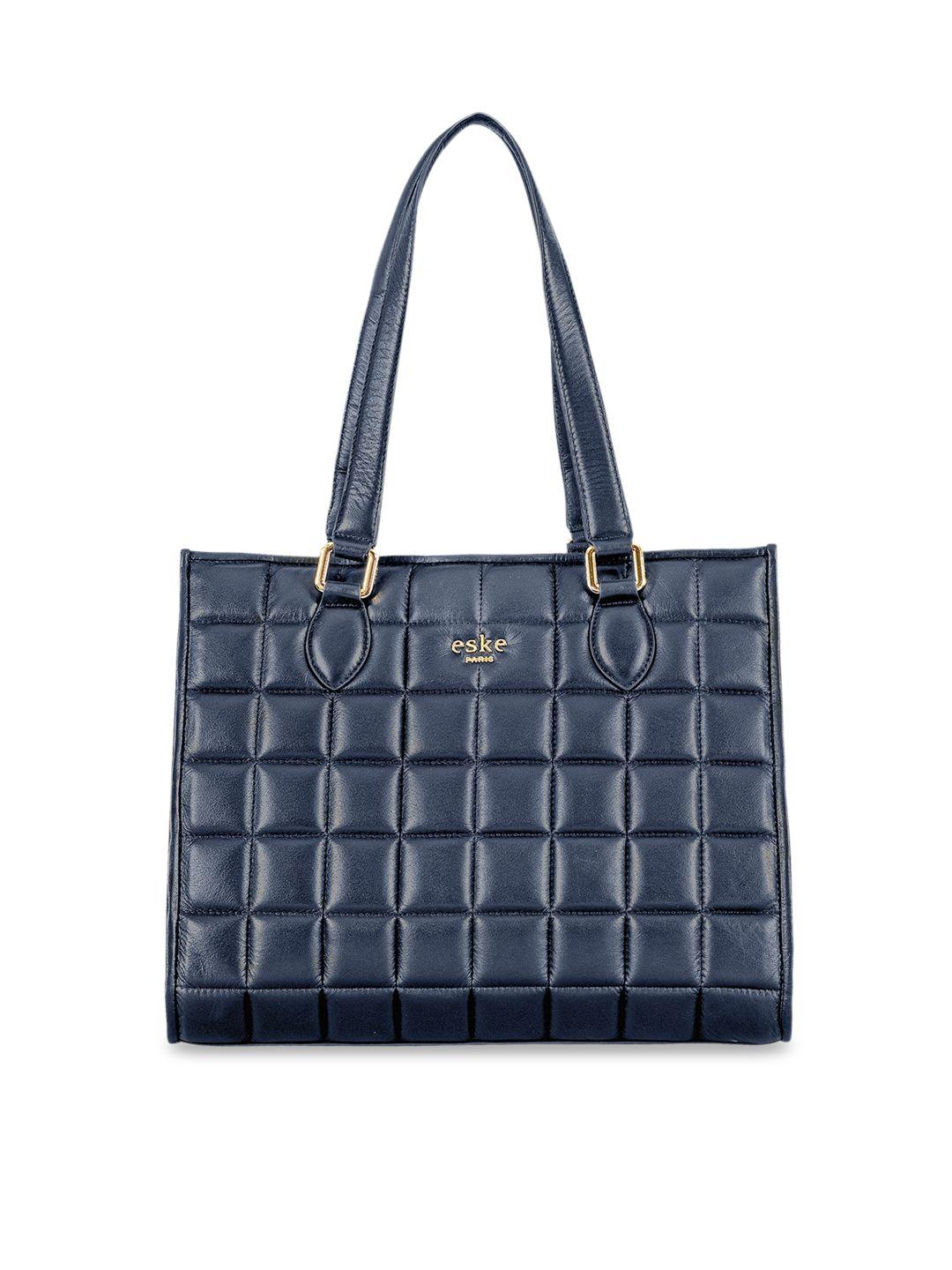 eske navy blue leather structured handheld bag with quilted