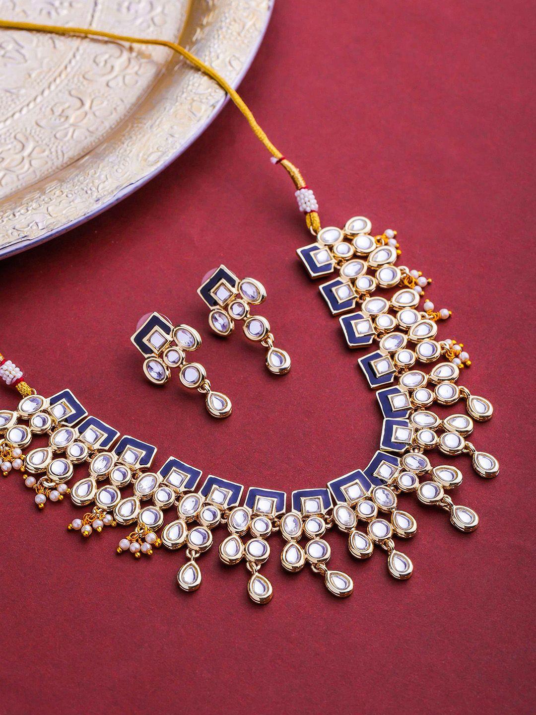 estele gold-plated white kundan-studded & beaded jewellery set