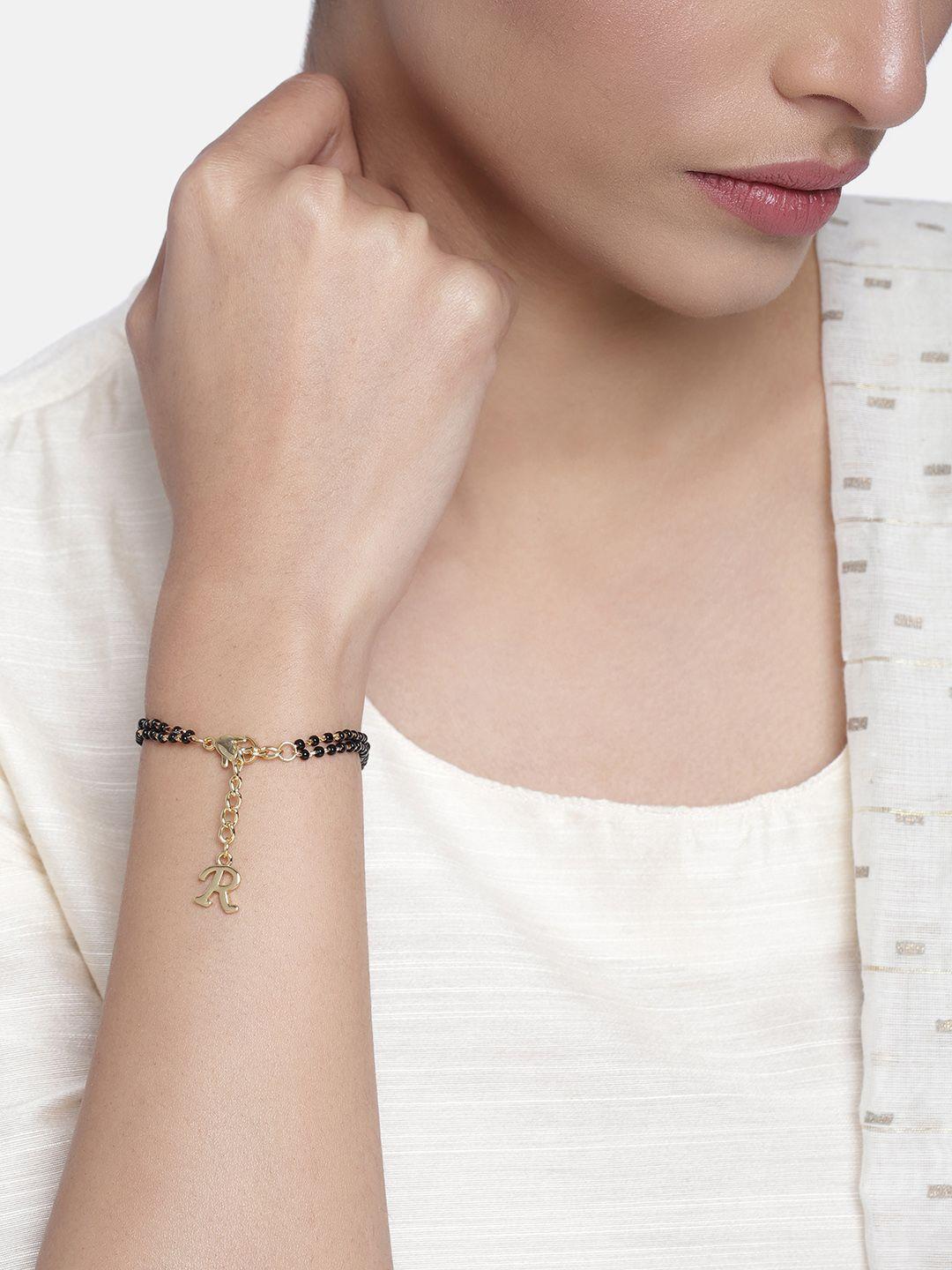 estele women gold-toned & black handcrafted gold-plated link bracelet