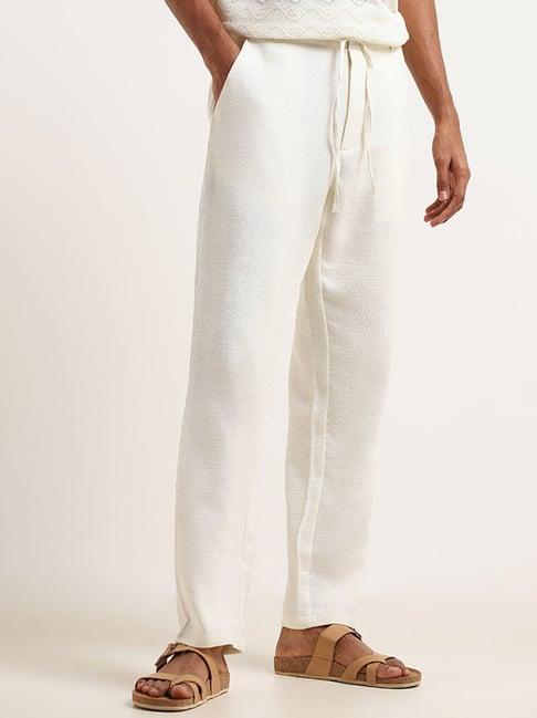 eta by westside off white textured cotton-blend trousers