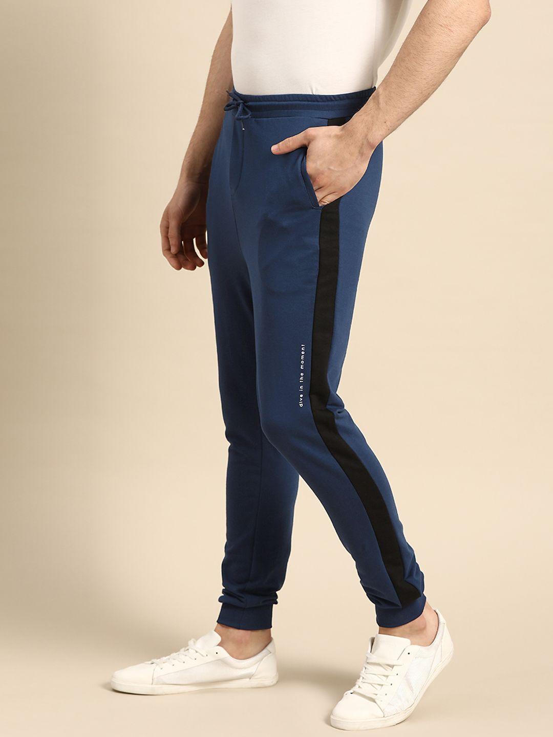 ether men navy blue solid joggers