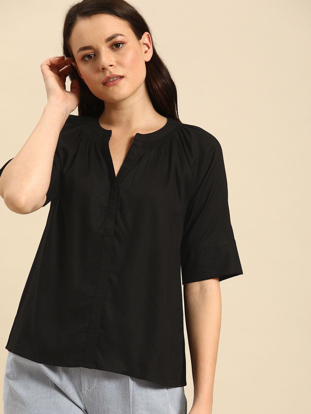 ether women black solid top