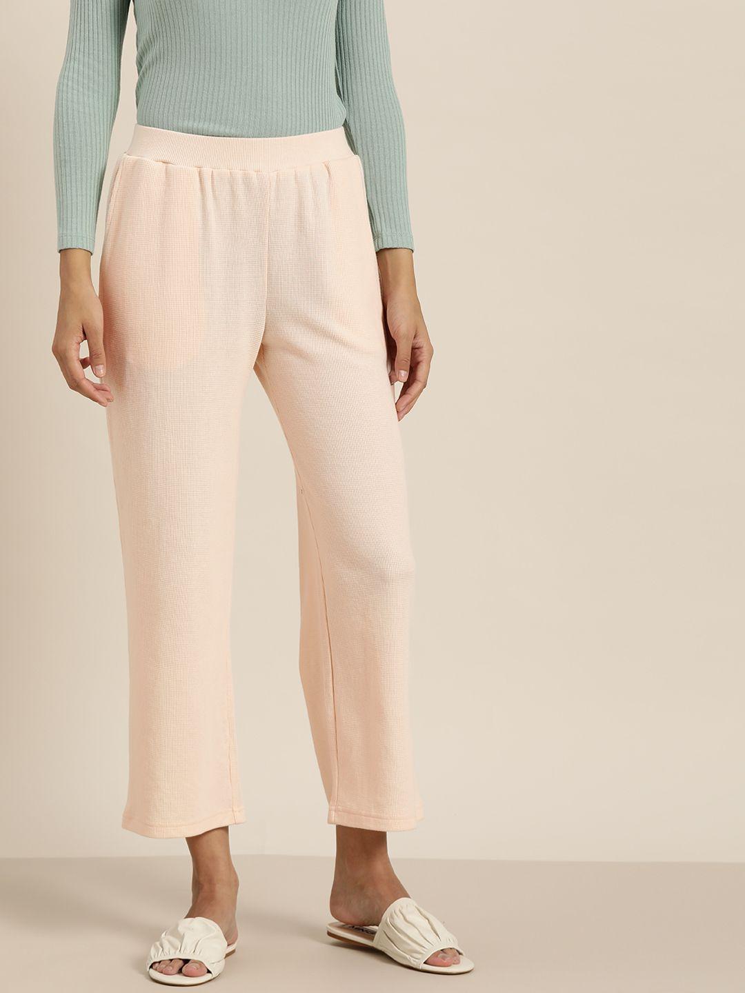 ether women peach-coloured self-design cropped trousers