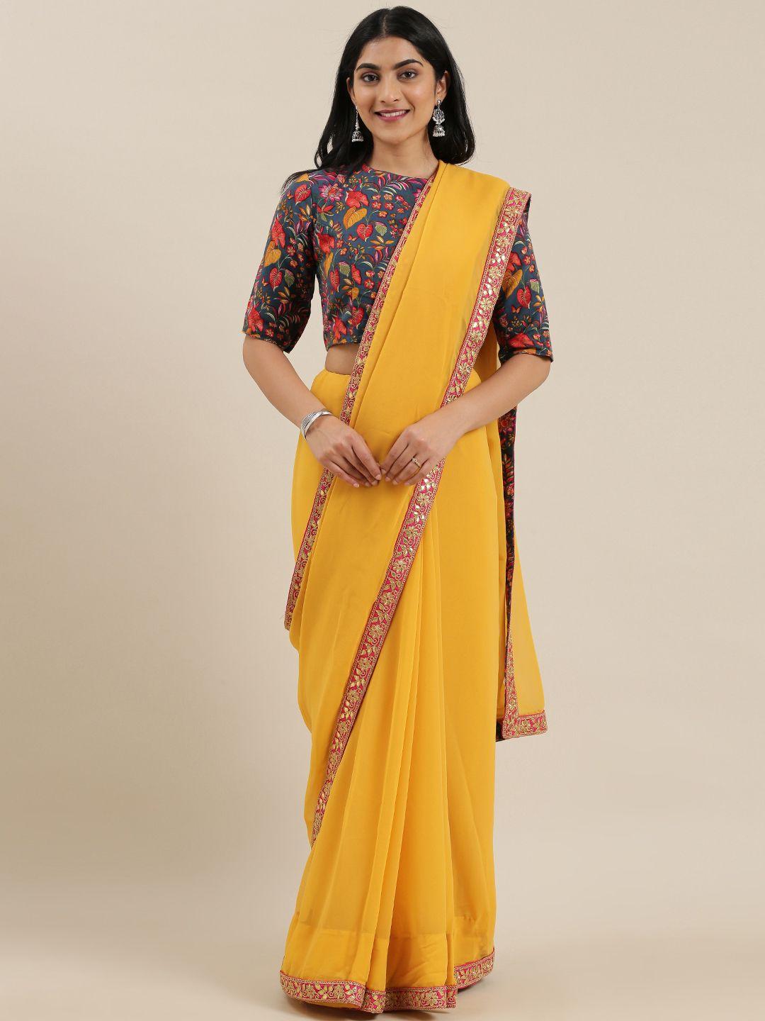 ethnovog yellow solid saree