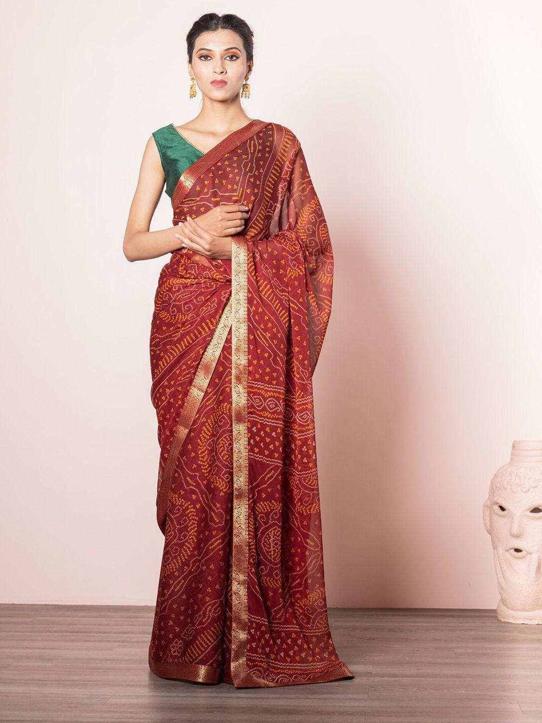 exclusiva red & yellow ethnic motifs bandhani print saree with zari border