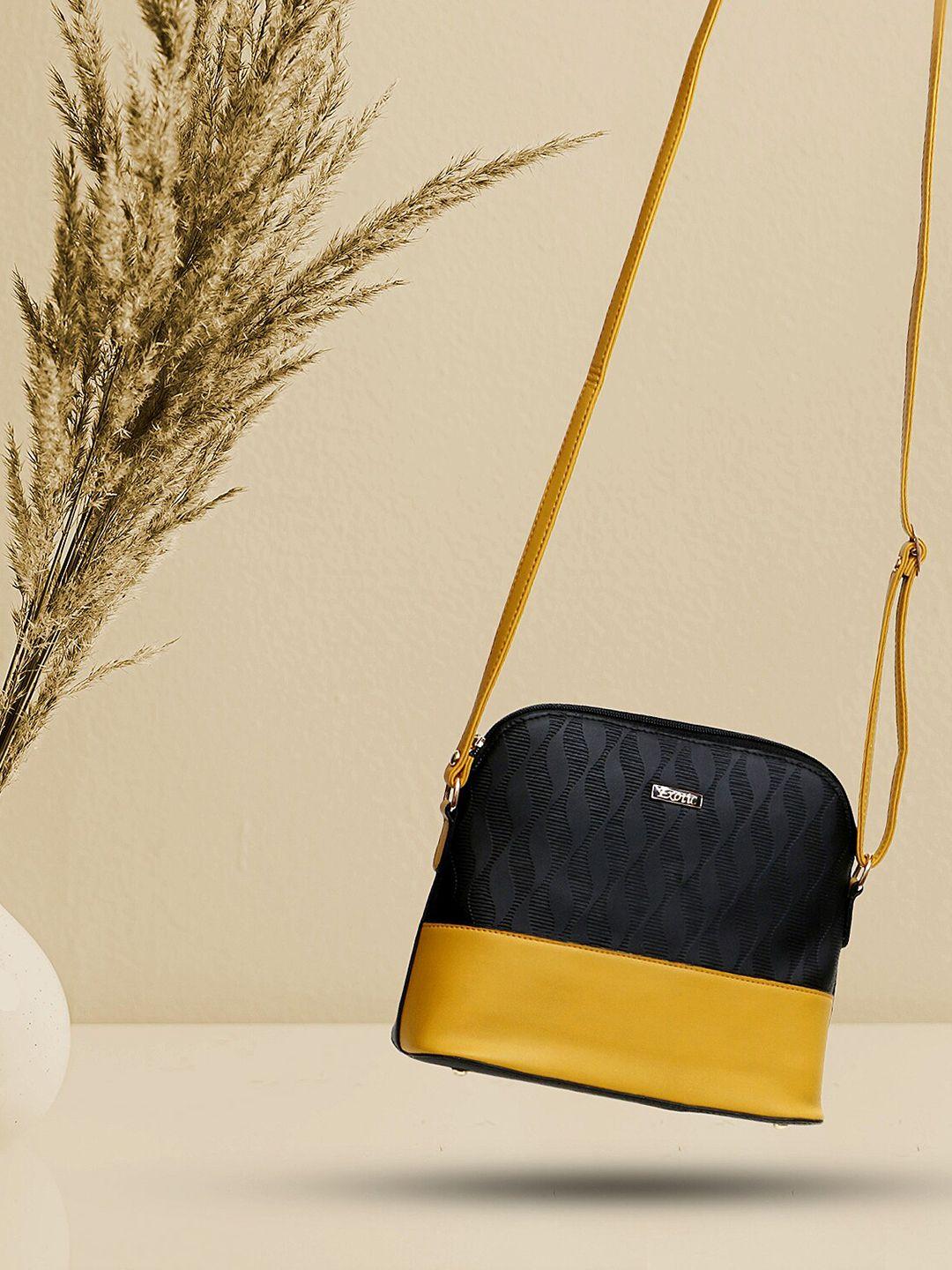 exotic colourblocked structured sling bag
