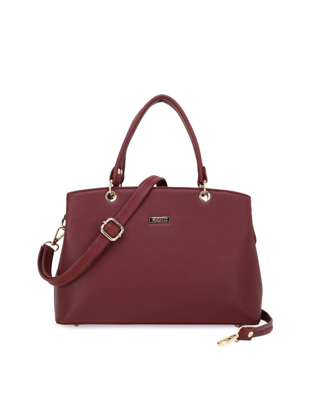 exotic maroon pu structured handheld bag with tasselled