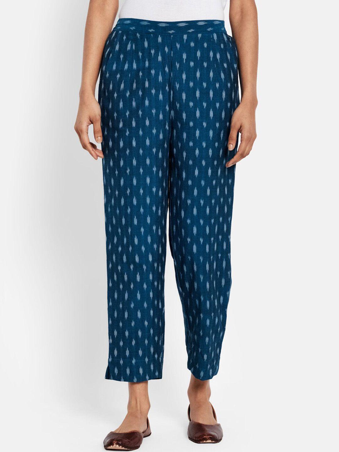 fabindia women blue ikat printed tapered fit printed cotton cropped trousers