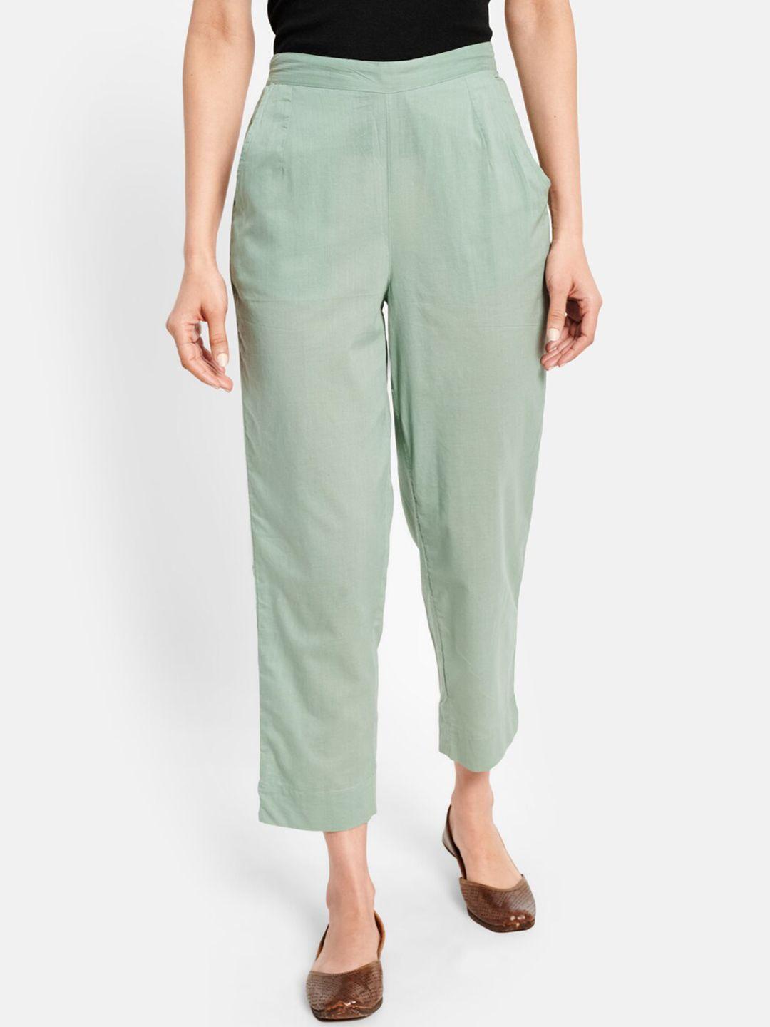 fabindia women green solid cotton trousers