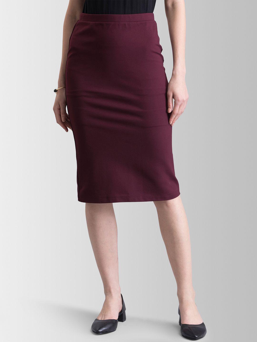 fablestreet women maroon solid straight skirt