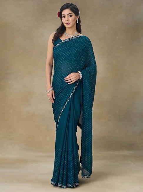 fabmora teal blue embellished saree with blouse