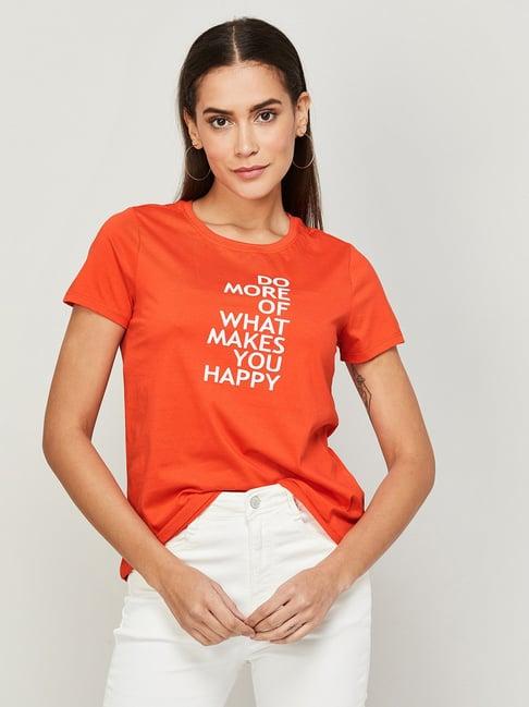 fame forever by lifestyle orange cotton graphic print top