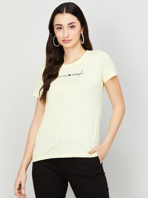 fame forever by lifestyle yellow cotton graphic print top