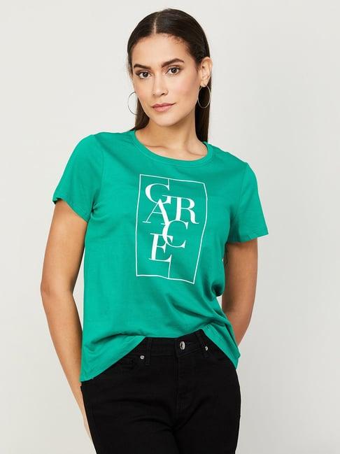 fame forever by lifestyle green cotton graphic print top