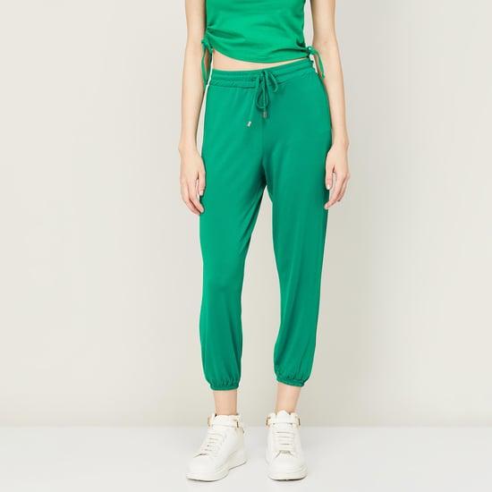 fame forever women solid ankle-length jogger trousers