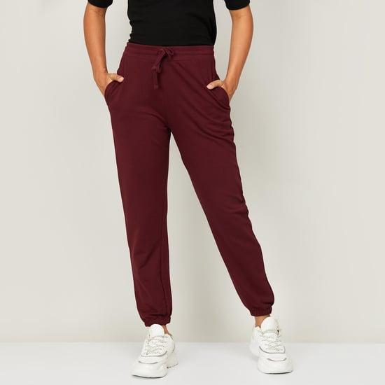 fame forever women solid drawstring closure joggers