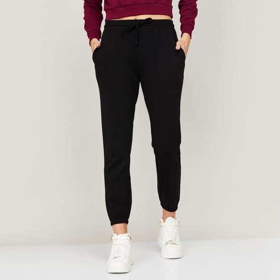 fame forever women solid elasticated joggers