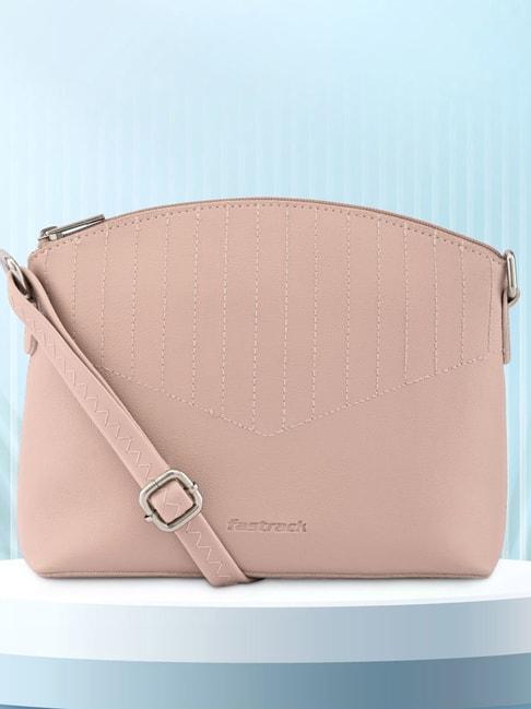 fastrack pink faux leather textured sling handbag