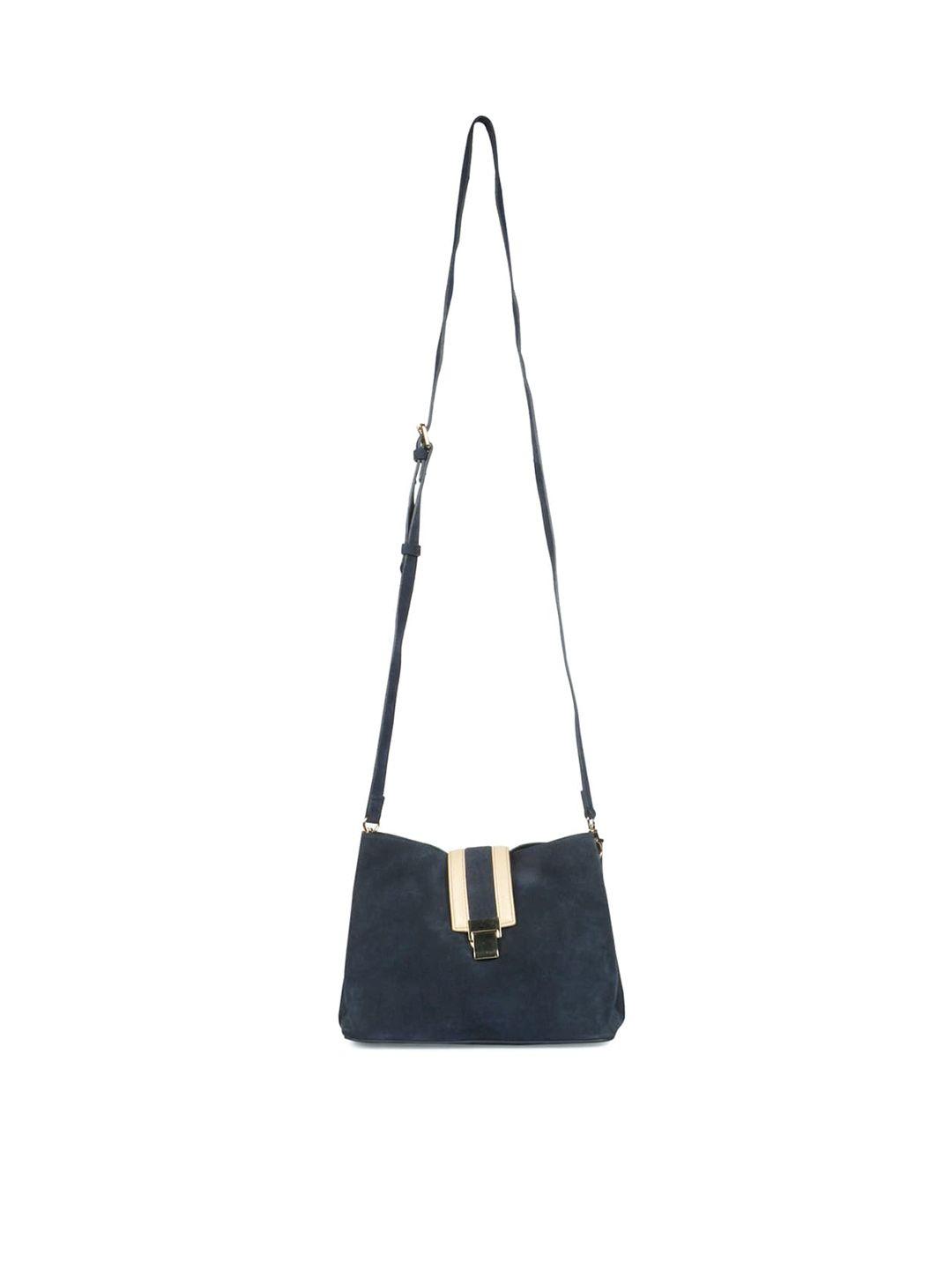 favore textured leather structured sling bag