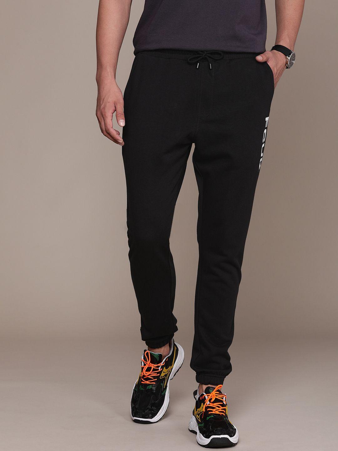 fcuk men brand logo printed mid-rise regular joggers