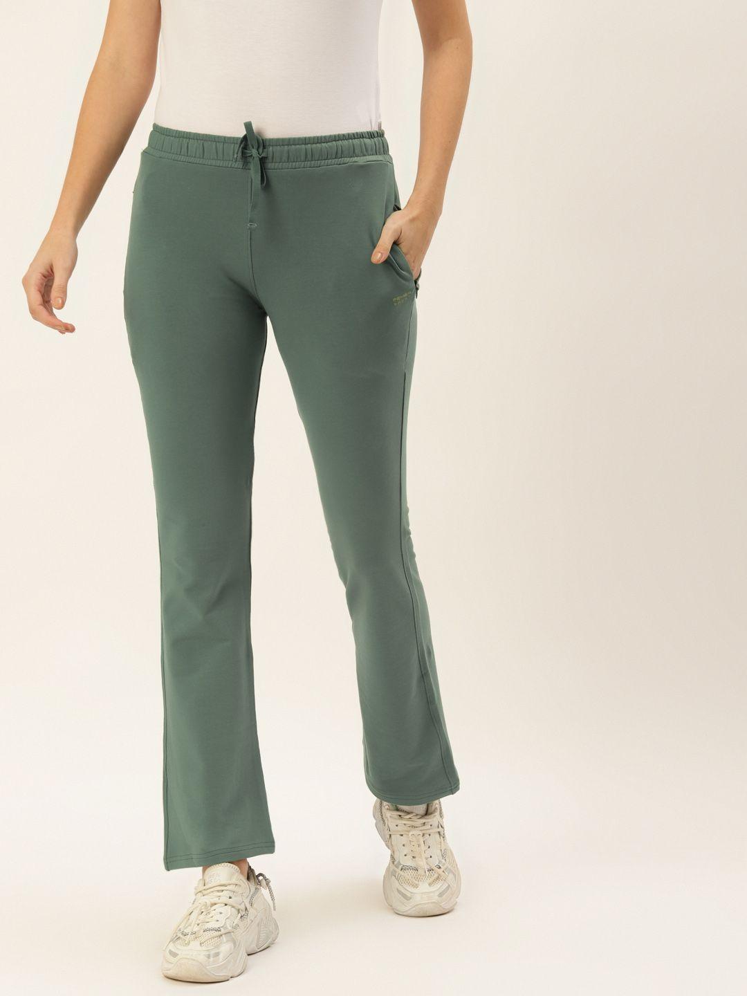 femea women green solid bootcut fit track pants