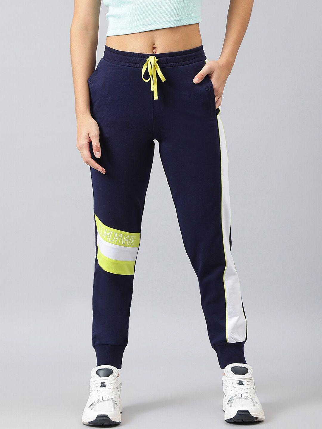 femea women navy blue & lime green colourblocked joggers