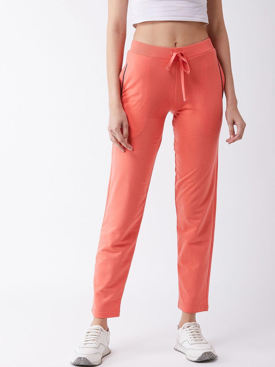 femea women peach-coloured solid slim-fit track pants