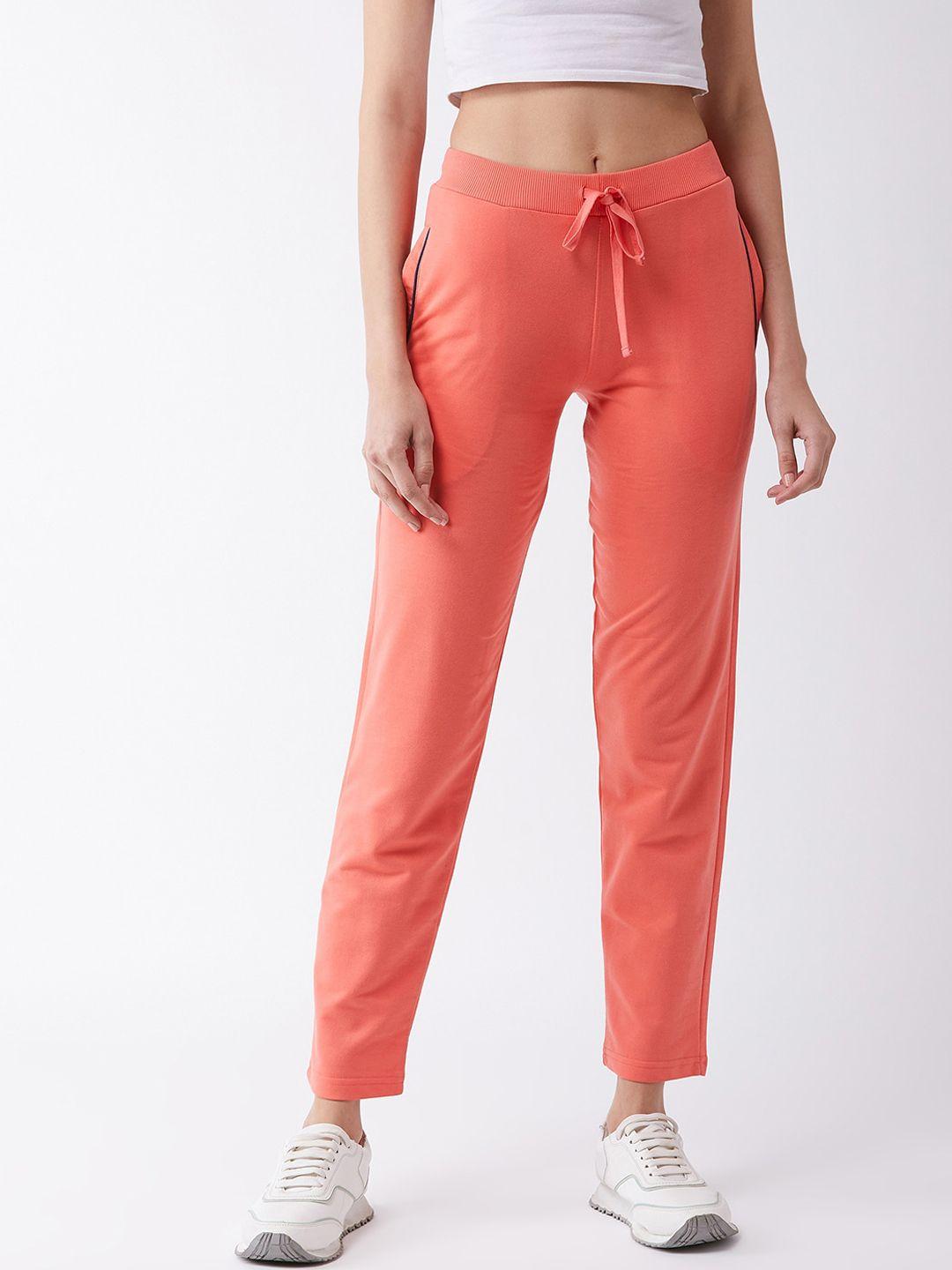 femea women peach-coloured solid slim-fit track pants