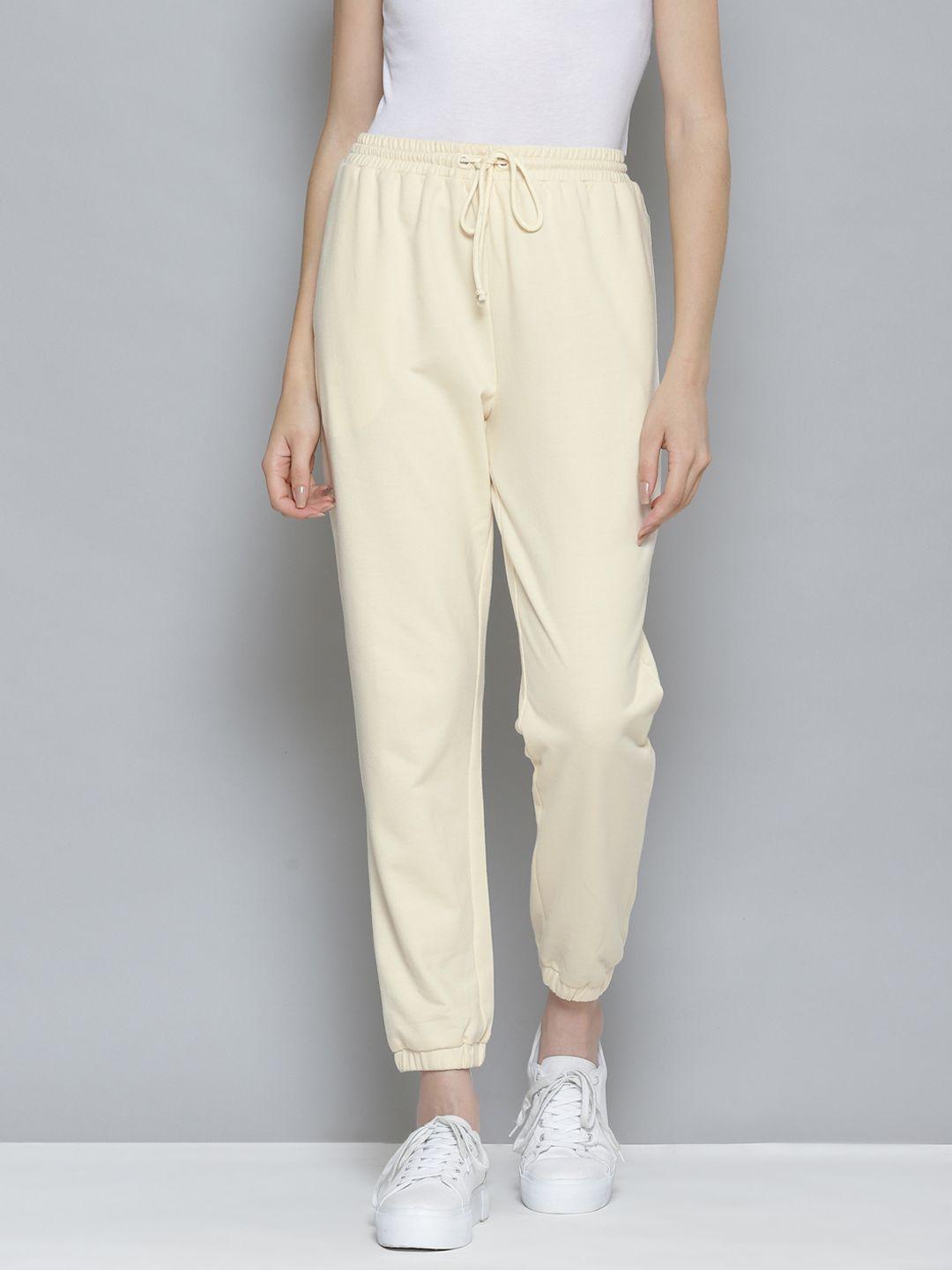 femella women off white solid track pants