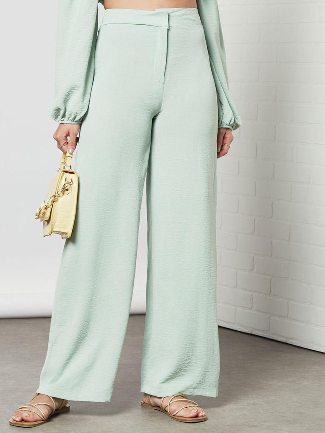 femme luxe women green solid trousers