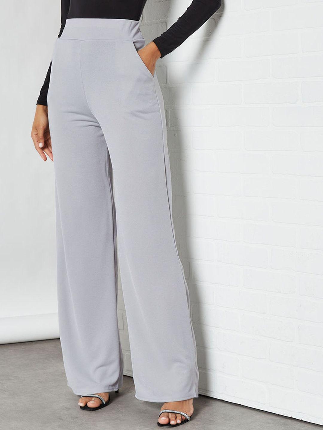 femme luxe women grey solid flared trousers