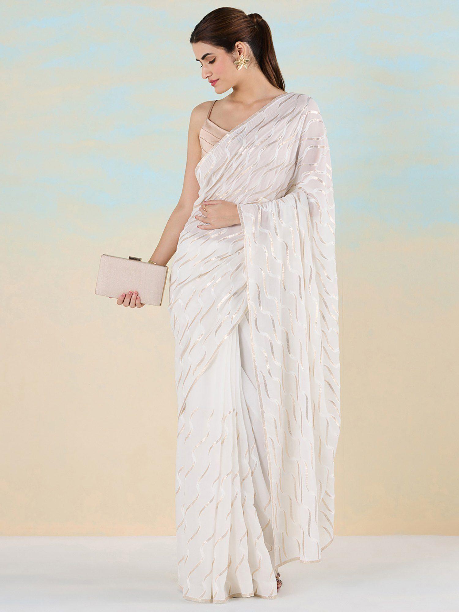 festive abstracts off white saree with unstitched blouse