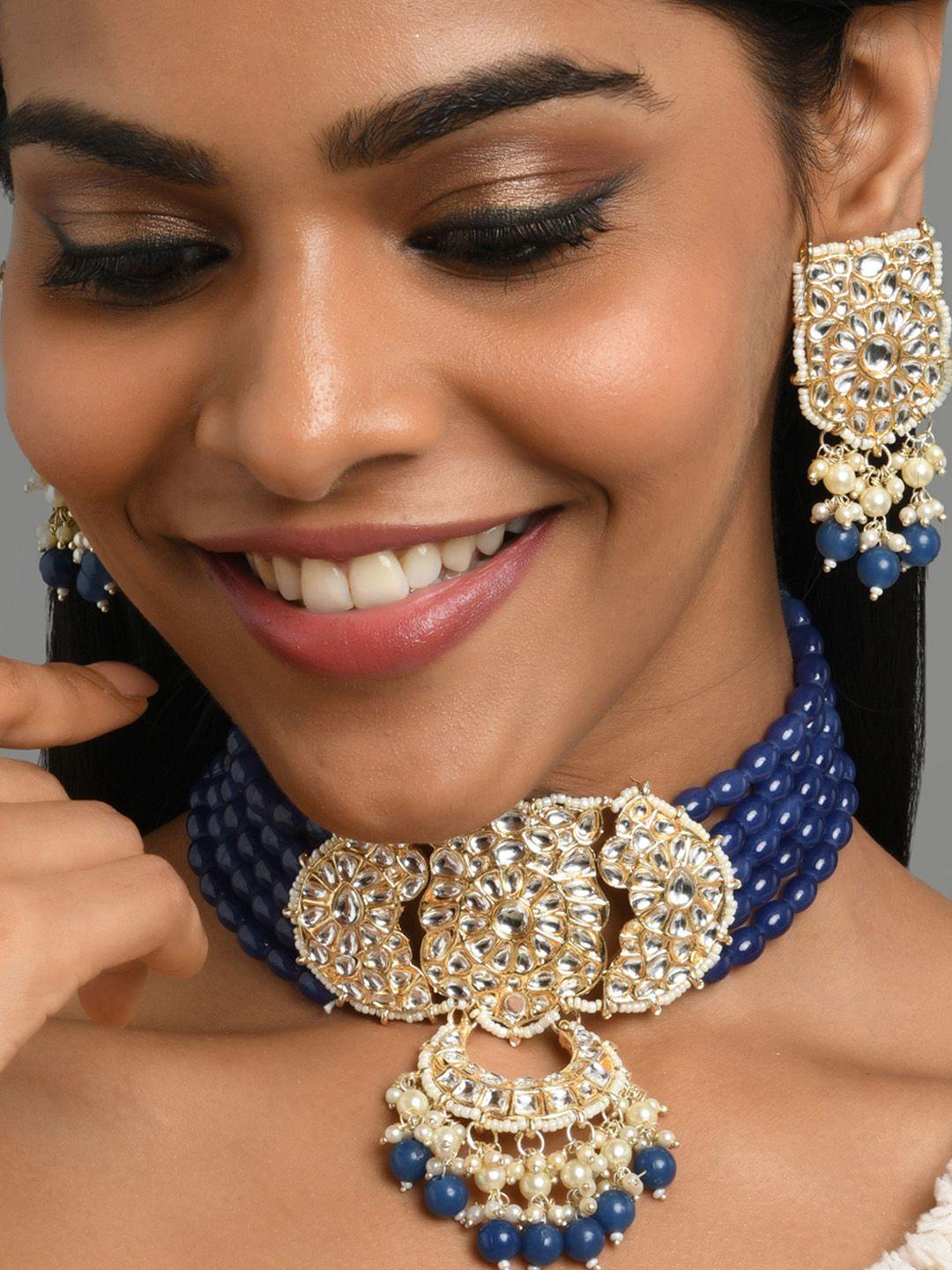 fida gold-plated & blue stone-studded & beaded layered jewellery set