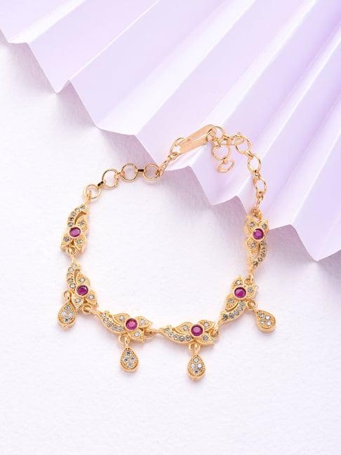 fida purple stones american diamond gold-plated floral wraparound bracelet for women