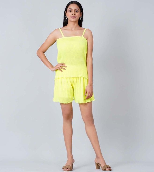 first resort by ramola bachchan neon green camisole and pleated shorts set