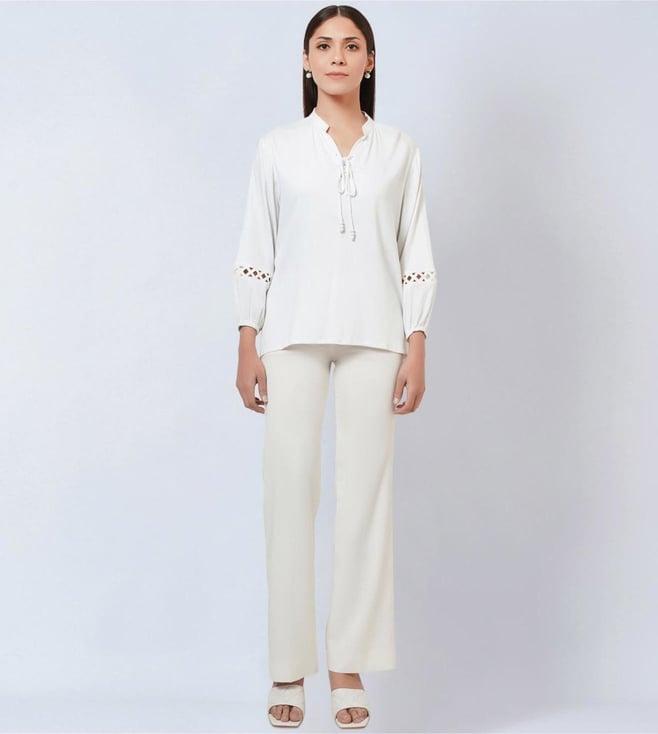 first resort by ramola bachchan white blouson top