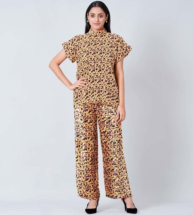 first resort by ramola bachchan yellow animal print top and knife pleated palazzo set