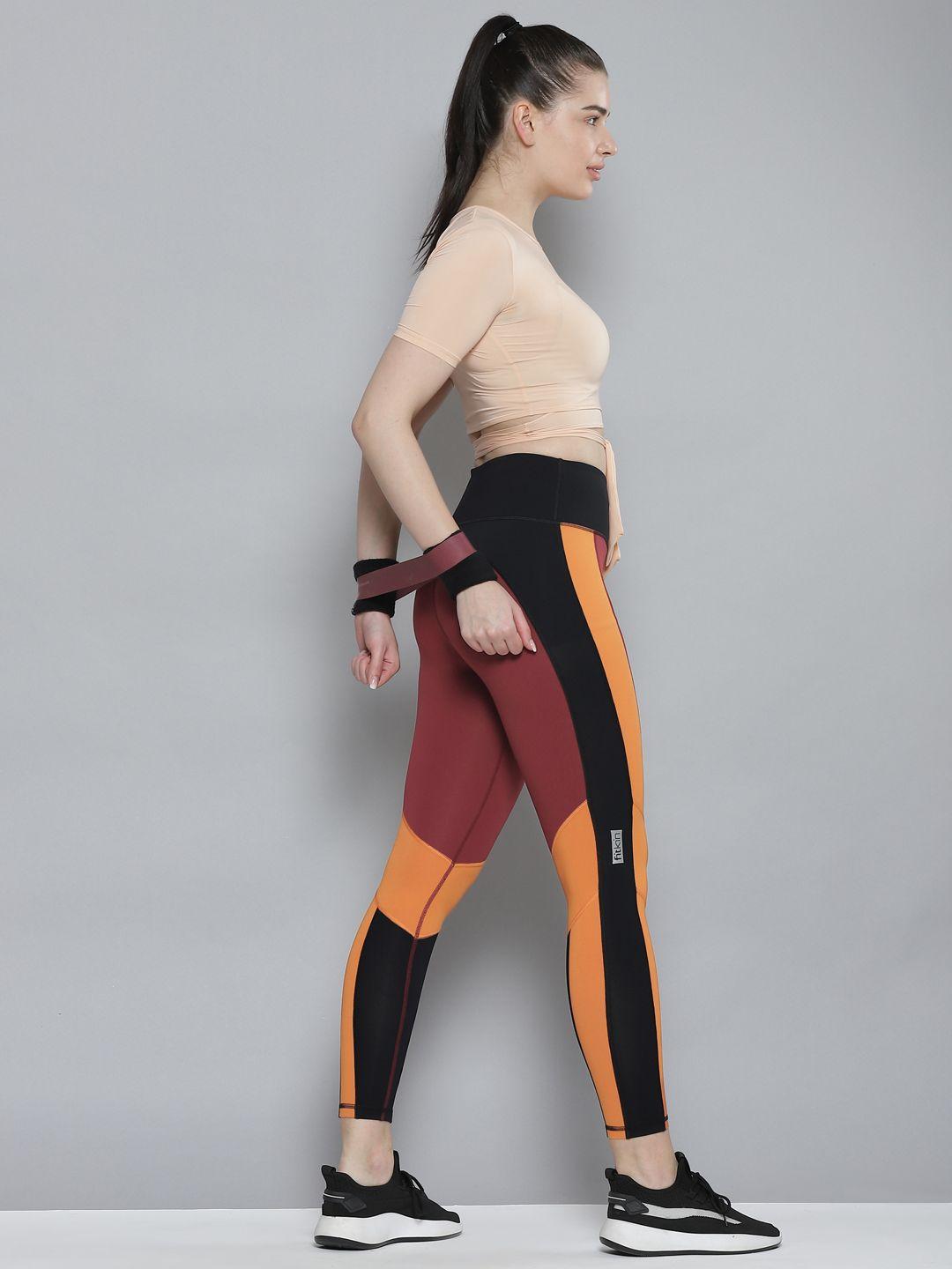 fitkin women maroon & rust orange colourblocked cross workout quick dry tights