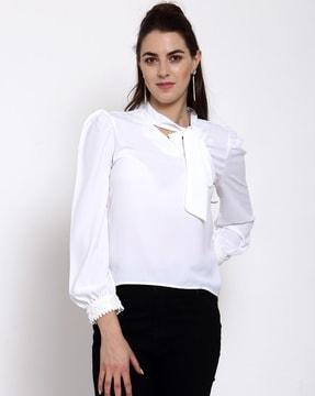 fitted top with cuffed sleeves