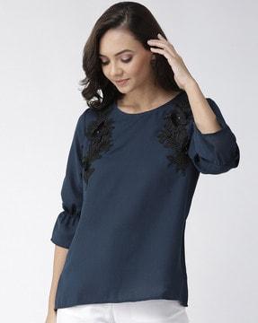 fitted top with floral applique