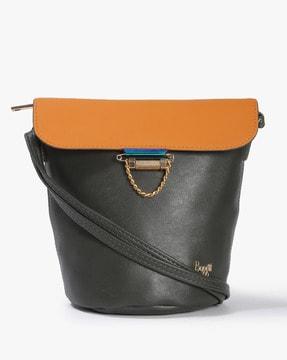 flap-over handbag with metal accent