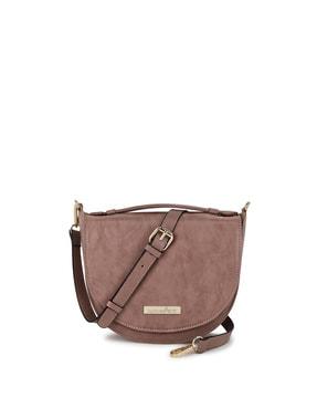 flap-over sling bag with detachable strap