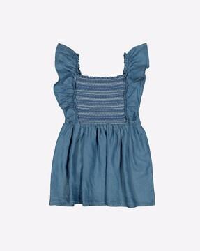 flared top with smocked yoke