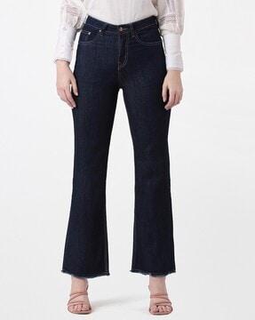flared jeans with frayed hems