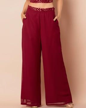 flared palazzo pants with embroidered waist