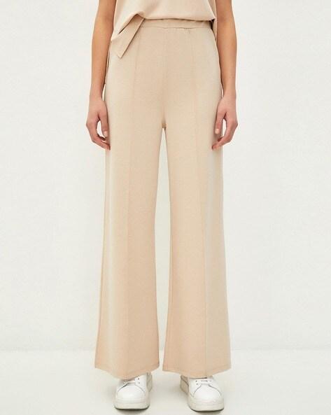 flared track pants with elasticated waist