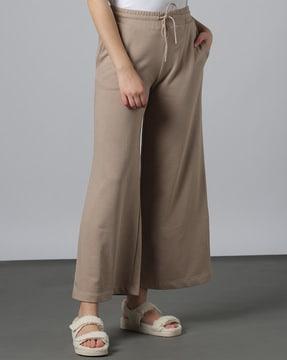 flared track pants with insert pockets