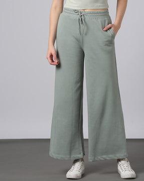 flared track pants with insert pockets