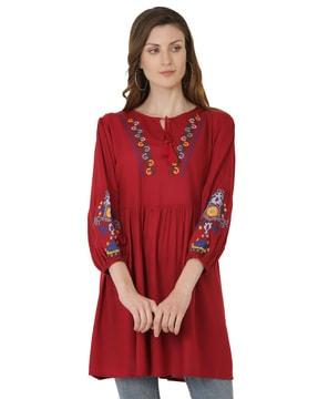 flared tunic with embroidery